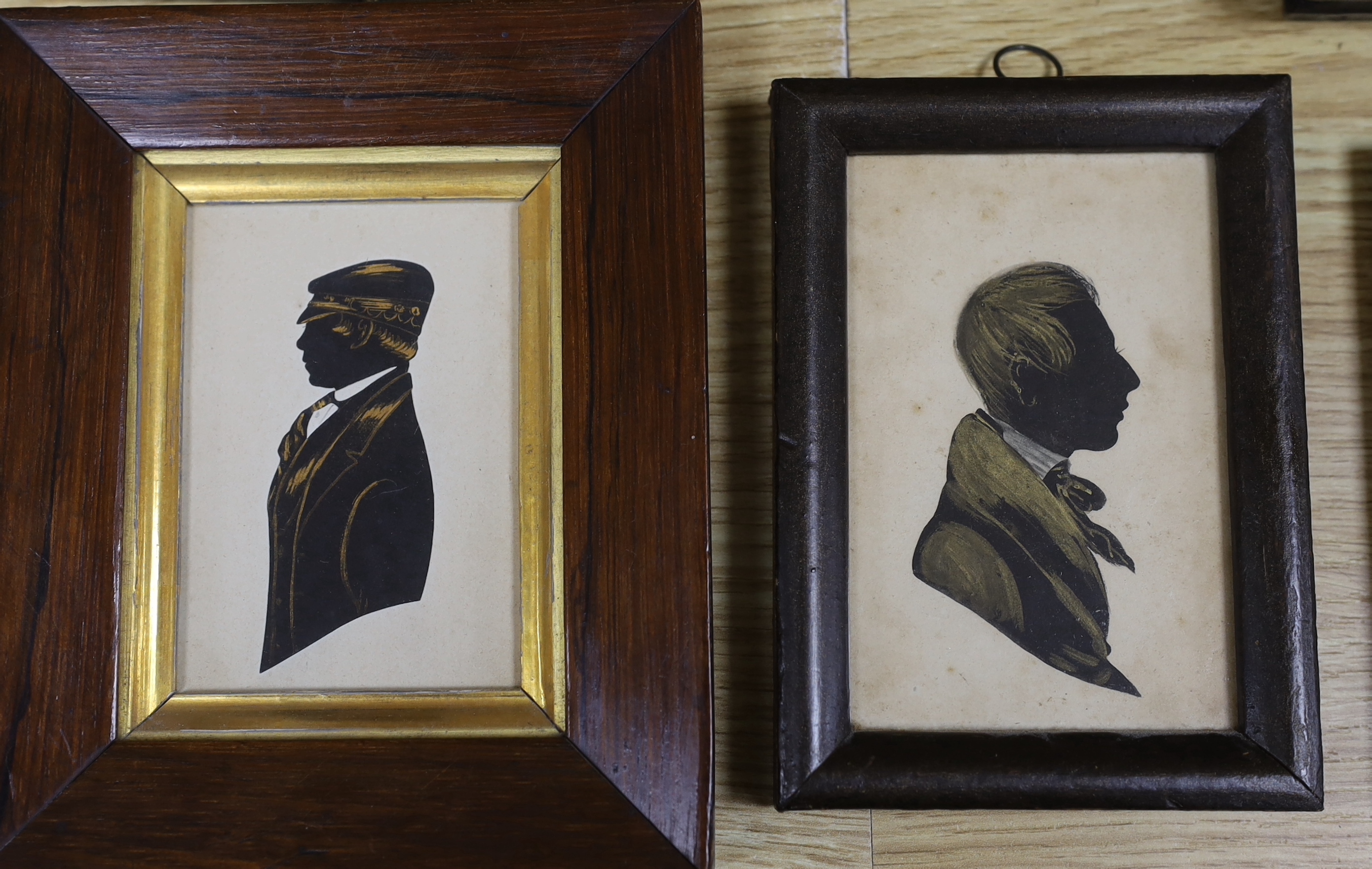 Six assorted 19th century silhouettes including H.J. Walter, cut and bronzed profile of a boy, 1850, 9 x 6cm; Fred Brookes, profile of a bearded gentleman and a bronzed study of a tutor, 10 x 7.5cm